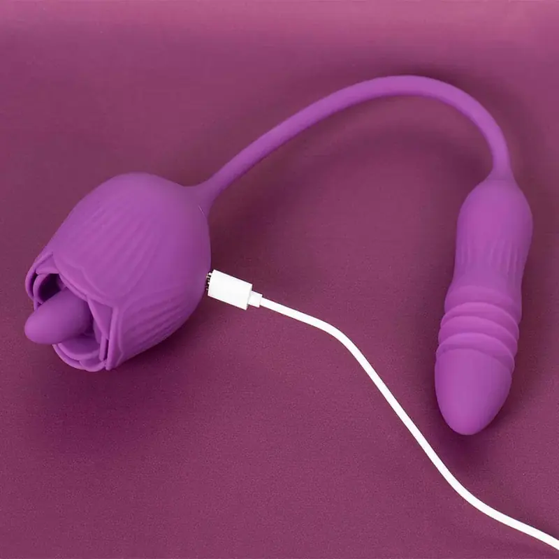 A purple Rhea device with a white charging lead connected in the source image