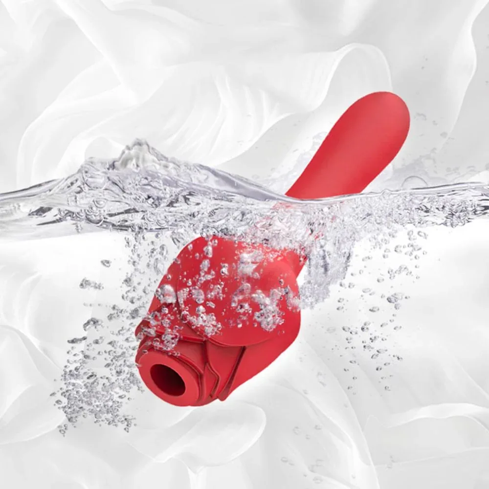 Roselle Cross Rose Suction and Shaft Vibrator — product shown with water splashes