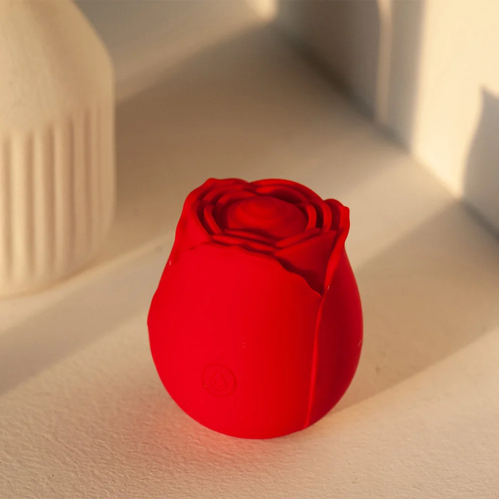 Roselle Tap Rose Toy — red rose tapping toy upright view